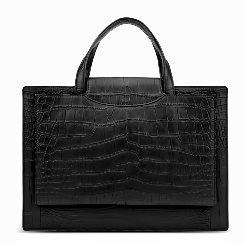 Black crocodile-embossed leather handbag with top handles and front flap.